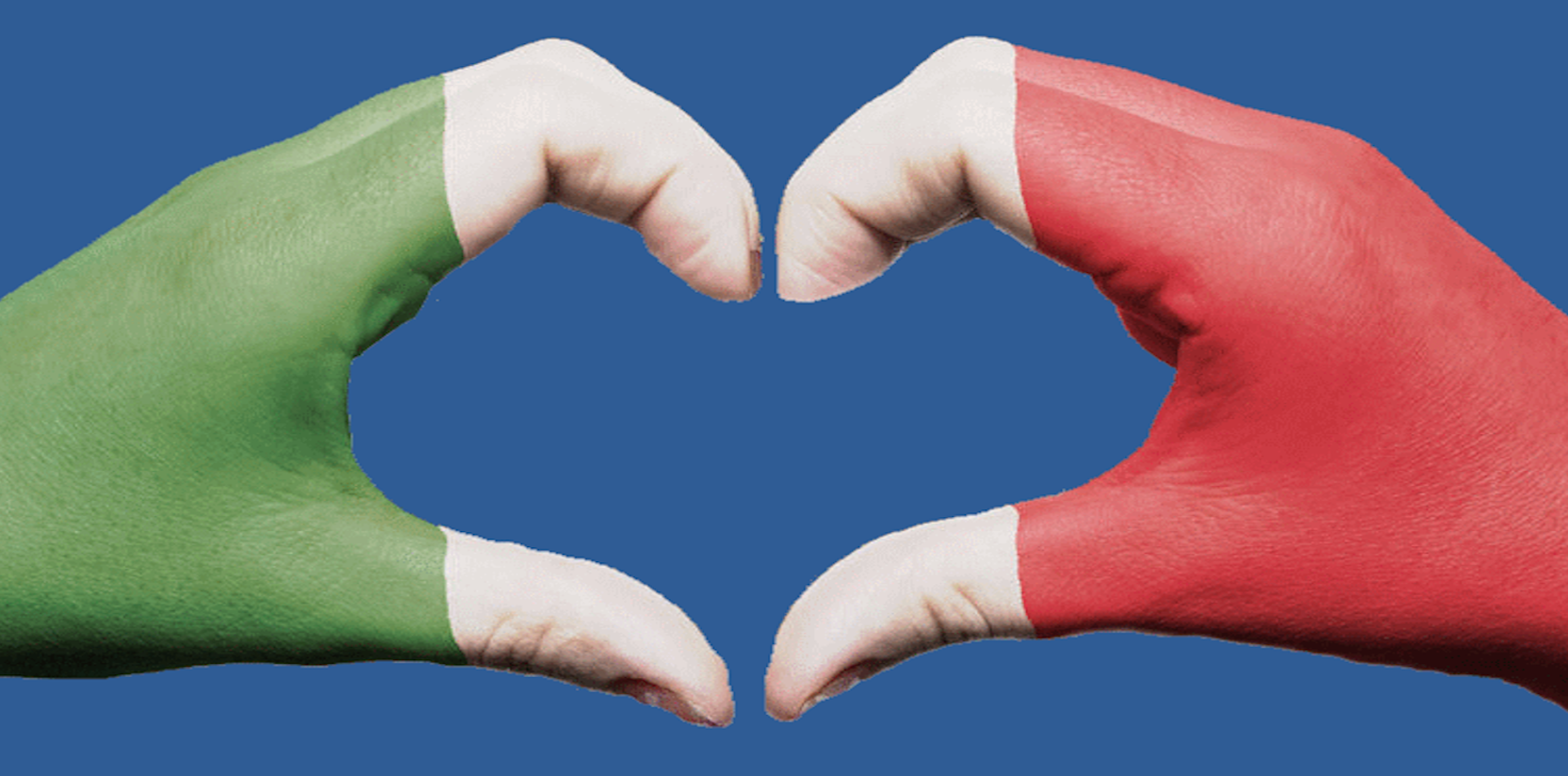 Mani dipinte con il tricolore italiano formano un cuore